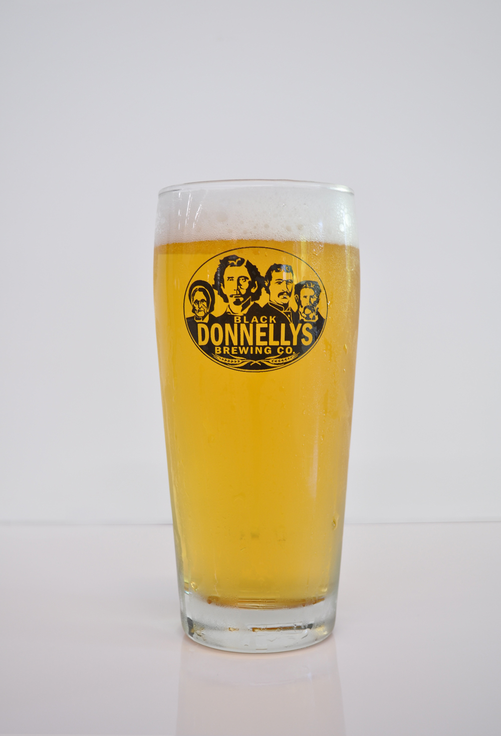 A refreshing pint of Black Donnellys Brewing Company Roman Line Lager beer.